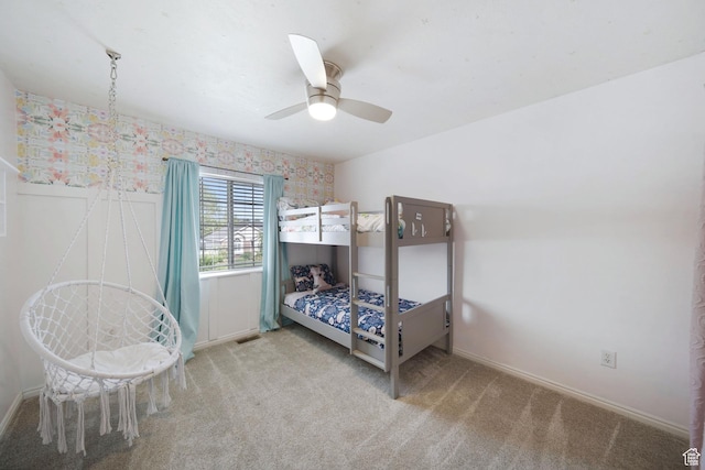 6507 S Silver Medal Dr, Taylorsville, UT 84129 - bedroom featuring carpet, baseboards, a ceiling fan, and wallpapered walls