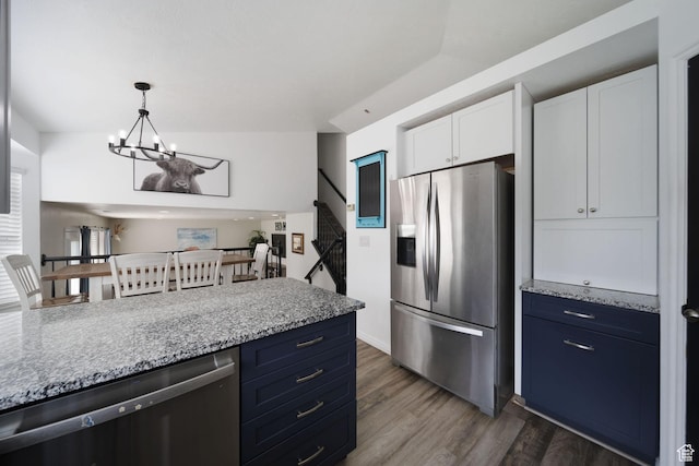 6507 S Silver Medal Dr, Taylorsville, UT 84129 - kitchen featuring stainless steel fridge with ice dispenser, dishwasher, a chandelier, white cabinetry, and dark wood finished floors