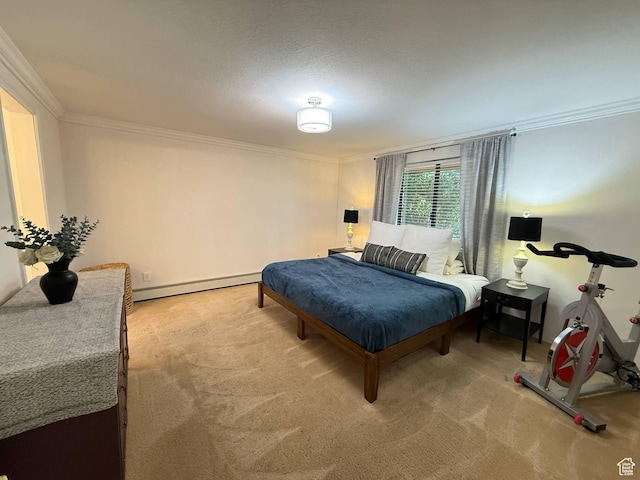 carpeted bedroom with baseboard heating and crown molding