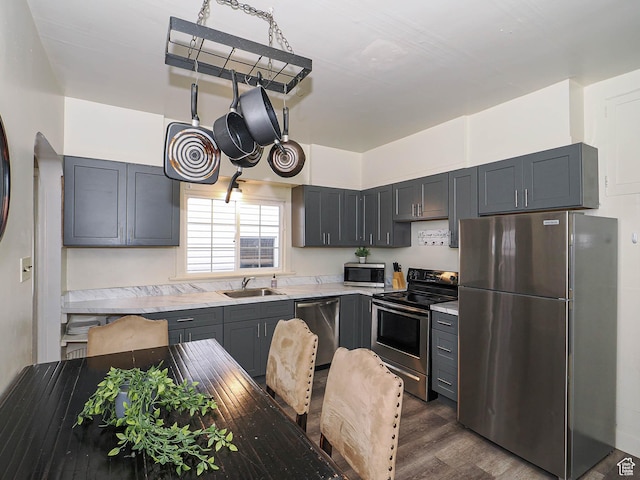 466 N 200 E, Provo, UT 84606 - kitchen with appliances with stainless steel finishes, a sink, dark wood-type flooring, light countertops, and gray cabinets