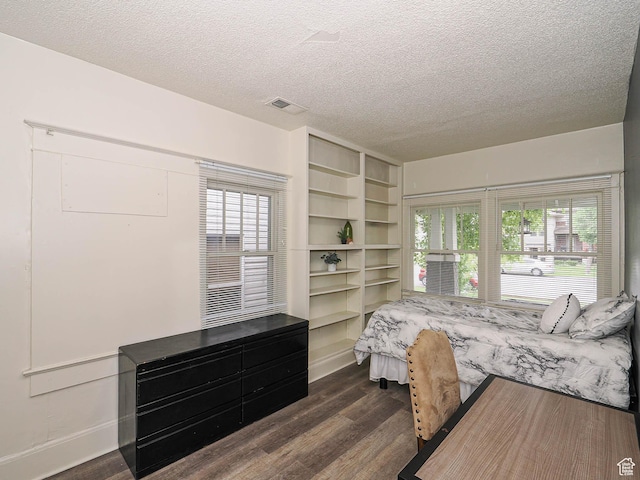 466 N 200 E, Provo, UT 84606 - bedroom featuring dark wood-style floors, a textured ceiling, multiple windows, and baseboards