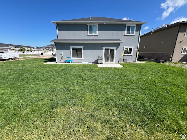 1297 W 450 N, Springville, UT 84663 - rear view of property with stucco siding, a lawn, and a patio area