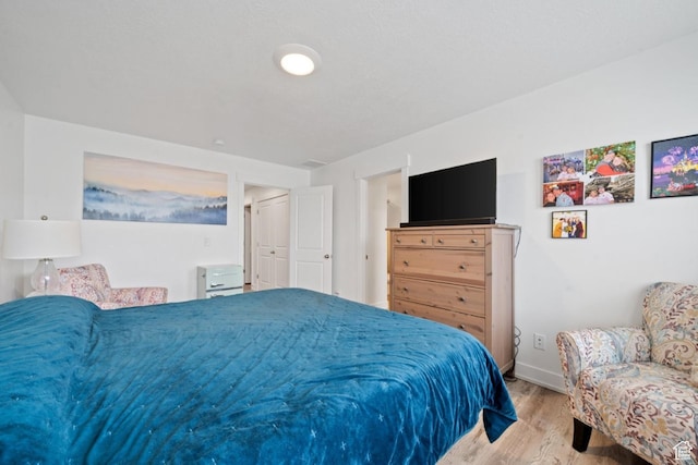 968 W 960 N Unit T3, Tremonton, UT 84337 - bedroom with wood finished floors and baseboards