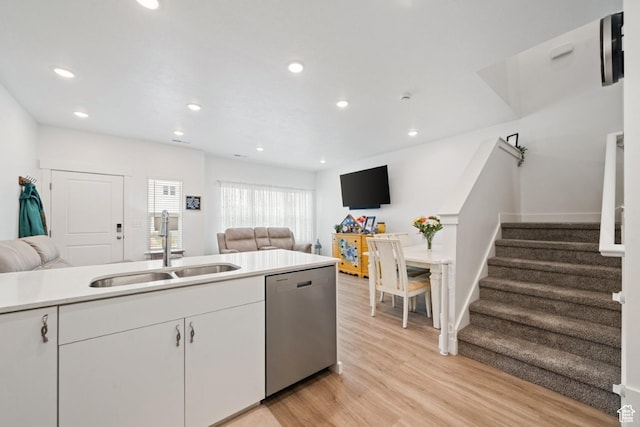 968 W 960 N Unit T3, Tremonton, UT 84337 - kitchen featuring dishwasher, a sink, open floor plan, light wood-style floors, and recessed lighting