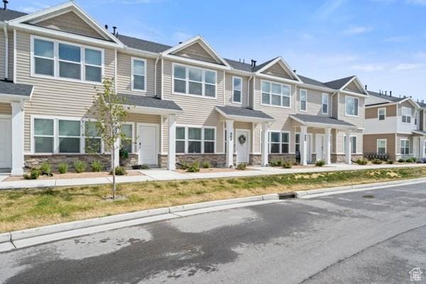 968 W 960 N Unit T3, Tremonton, UT 84337 - multi unit property with stone siding and a residential view