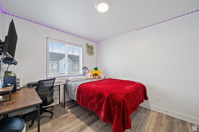 968 W 960 N Unit T3, Tremonton, UT 84337 - bedroom featuring wood finished floors, baseboards, and an office area