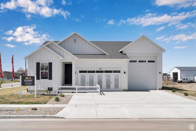 4053 W 2025 S Unit 40, Taylor, UT 84401 - modern farmhouse with board and batten siding, french doors, concrete driveway, a garage, and a shingled roof