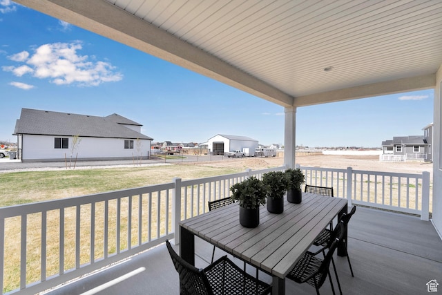 4053 W 2025 S Unit 40, Taylor, UT 84401 - balcony featuring outdoor dining area and a residential view