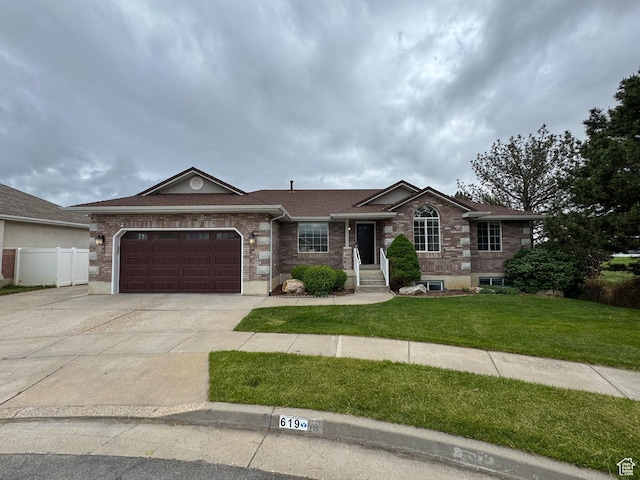 619 W 225 S, Layton, UT 84041 - ranch-style house with concrete driveway, a garage, brick siding, and a shingled roof