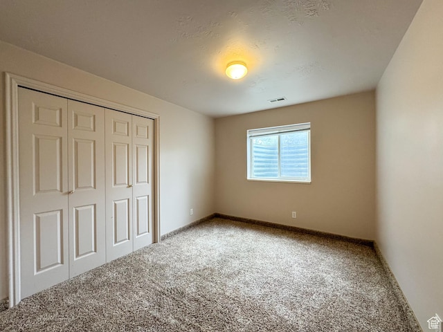 619 W 225 S, Layton, UT 84041 - unfurnished bedroom featuring carpet floors, a closet, and baseboards