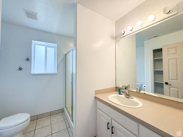 619 W 225 S, Layton, UT 84041 - full bath featuring toilet, a stall shower, vanity, and tile patterned flooring