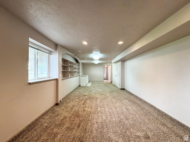 619 W 225 S, Layton, UT 84041 - spare room with light colored carpet, a textured ceiling, recessed lighting, and baseboards