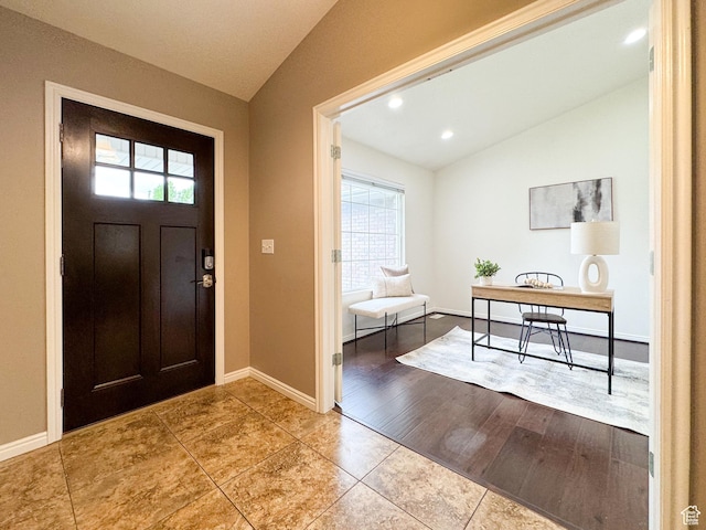 619 W 225 S, Layton, UT 84041 - foyer entrance featuring vaulted ceiling, healthy amount of natural light, tile patterned flooring, baseboards, and recessed lighting