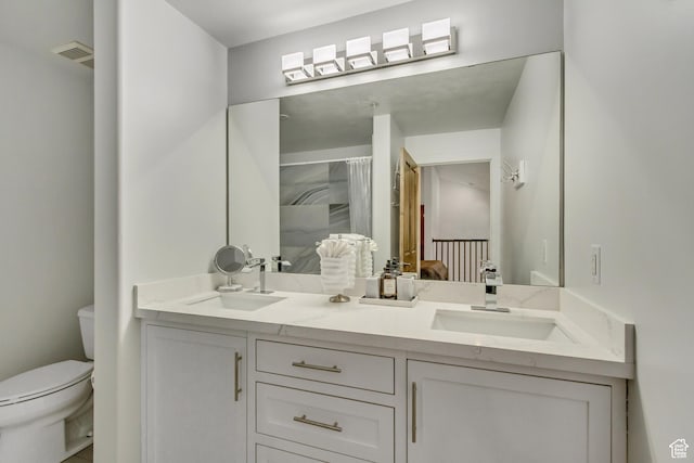 6641 N 2200 W Unit D-304, Park City, UT 84098 - full bathroom featuring toilet, double vanity, and a shower with curtain