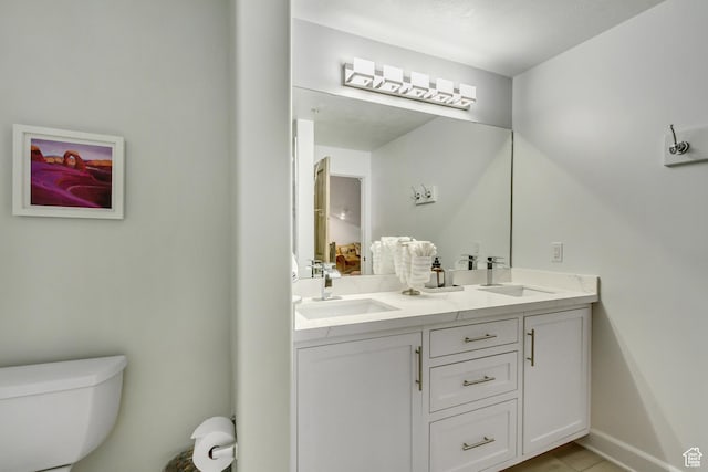 6641 N 2200 W Unit D-304, Park City, UT 84098 - bathroom featuring toilet, double vanity, and tile patterned floors
