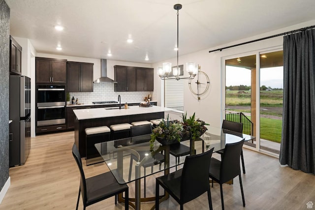 1513 E 820 N Unit 105, Salem, UT 84653 - dining room with a chandelier, light wood-type flooring, and recessed lighting