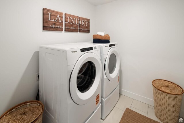 1513 E 820 N Unit 105, Salem, UT 84653 - laundry room with washer and dryer and light tile patterned floors