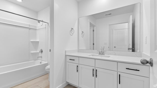 full bathroom with toilet, vanity, and shower / bathtub combination