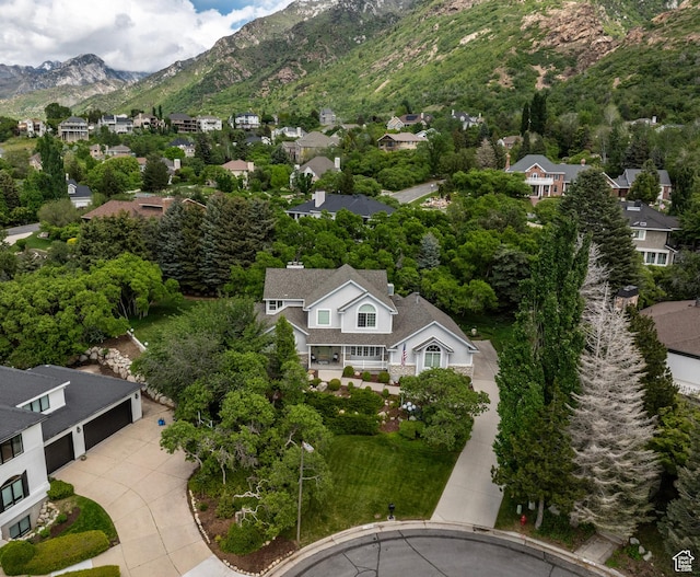 aerial view of residential area with mountains