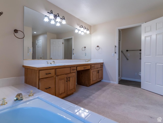 full bathroom with double vanity and toilet