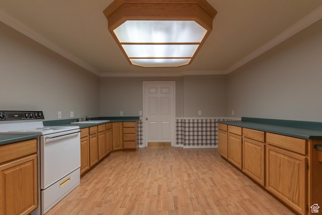 kitchen with electric stove, light wood-type flooring, ornamental molding, dark countertops, and a sink
