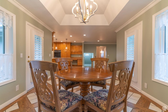 dining room featuring light tile patterned floors, recessed lighting, a chandelier, baseboards, and ornamental molding