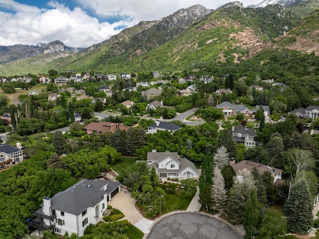 aerial view of residential area with a mountain backdrop