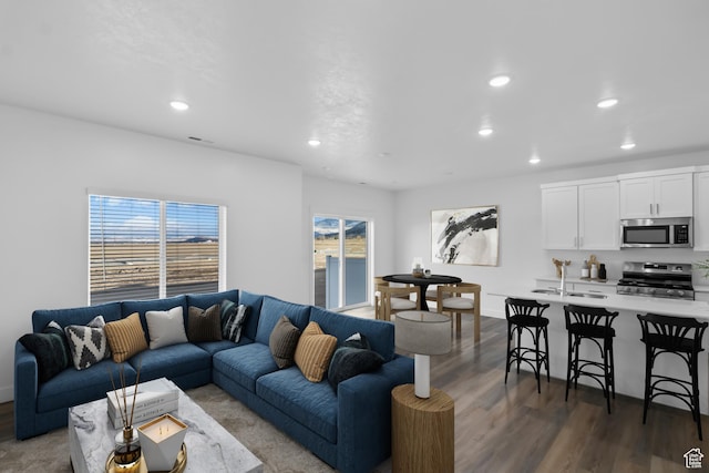 651 W 575 N, Smithfield, UT 84335 - living room with plenty of natural light, wood finished floors, recessed lighting, and baseboards