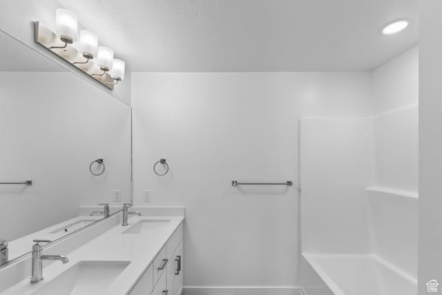 651 W 575 N, Smithfield, UT 84335 - full bathroom with double vanity and baseboards