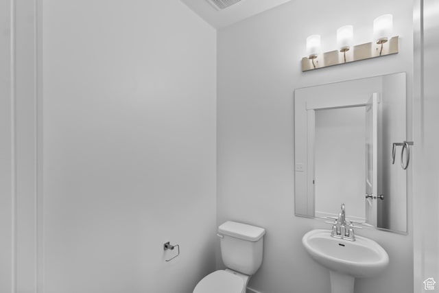 651 W 575 N, Smithfield, UT 84335 - half bath featuring a sink and toilet