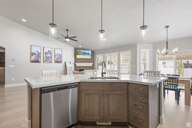 541 W 1960 N, Tooele, UT 84074 - kitchen featuring dishwasher, a sink, light countertops, ceiling fan, and lofted ceiling
