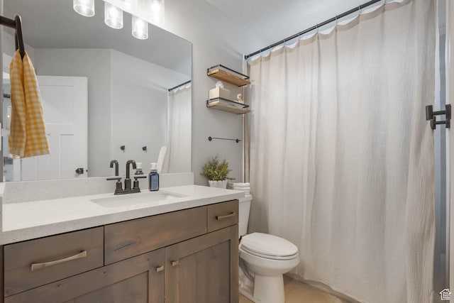 541 W 1960 N, Tooele, UT 84074 - bathroom featuring toilet, vanity, and tile patterned floors