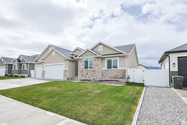 541 W 1960 N, Tooele, UT 84074 - craftsman-style home featuring stucco siding, stone siding, a gate, an attached garage, and concrete driveway