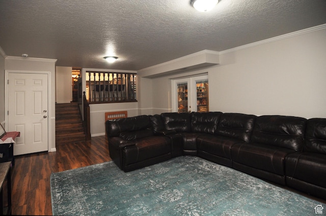 living area with wood finished floors, stairway, ornamental molding, a textured ceiling, and baseboards