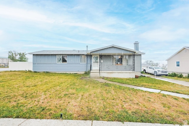 396 S 100 E, Tooele, UT 84074 - view of front of home with a porch, a chimney, and board and batten siding