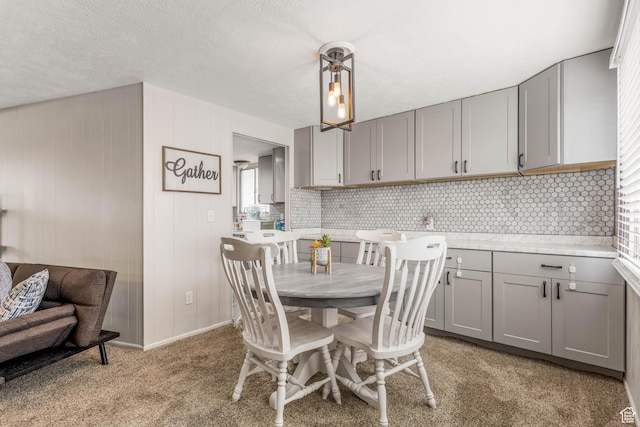 396 S 100 E, Tooele, UT 84074 - dining area featuring light carpet and baseboards