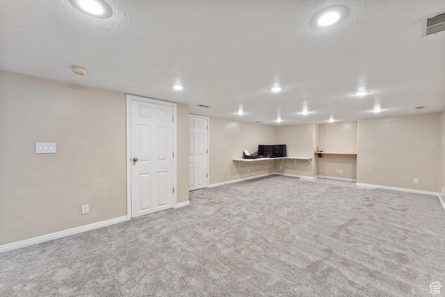 4948 S 1150 E, Ogden, UT 84403 - finished below grade area with carpet flooring, baseboards, recessed lighting, and a textured ceiling