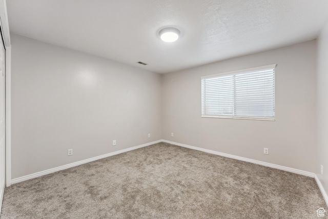 4948 S 1150 E, Ogden, UT 84403 - unfurnished room featuring carpet and baseboards