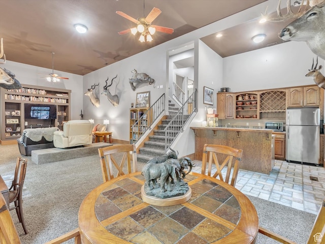 1921 E Mohawk Ln S, Ogden, UT 84403 - dining space featuring a ceiling fan and stairway