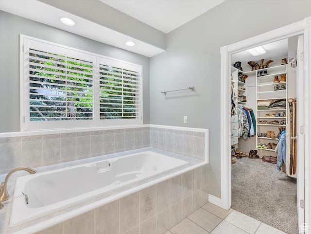 1921 E Mohawk Ln S, Ogden, UT 84403 - bathroom with tile patterned floors, a walk in closet, and a bath