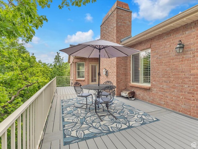 1921 E Mohawk Ln S, Ogden, UT 84403 - wooden deck with outdoor dining area