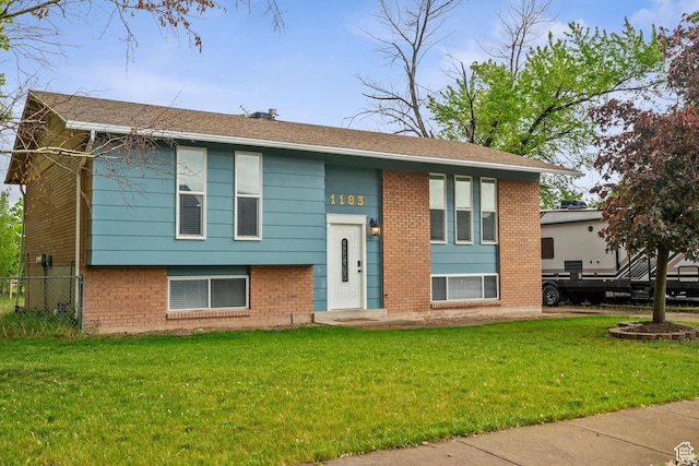 bi-level home with brick siding