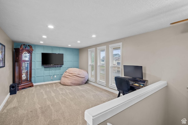 carpeted office with baseboards, recessed lighting, a ceiling fan, and a textured ceiling