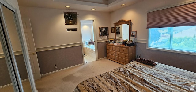 bedroom with light colored carpet and recessed lighting