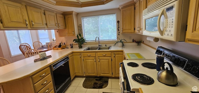 kitchen featuring white microwave, electric range oven, a sink, black dishwasher, and plenty of natural light