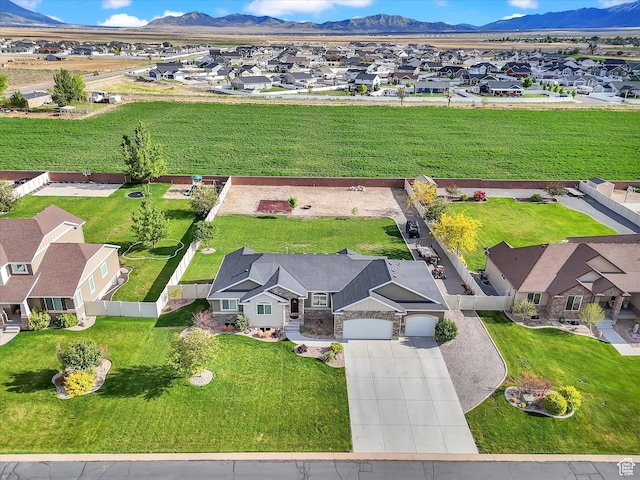 aerial view of residential area with mountains