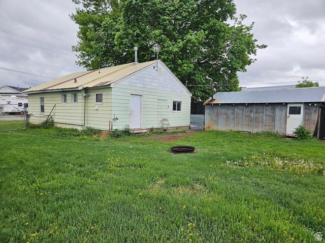 139 E 4th S, Preston, ID 83263 - view of yard featuring an outdoor fire pit
