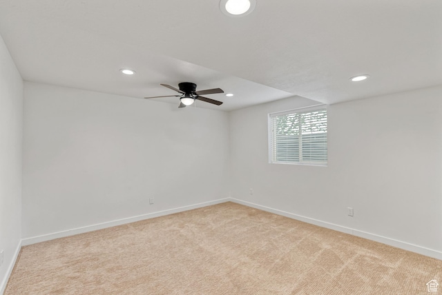 unfurnished room featuring light colored carpet, baseboards, recessed lighting, and ceiling fan
