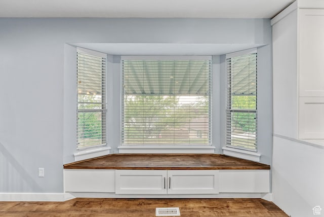 detailed view of wood finished floors and baseboards
