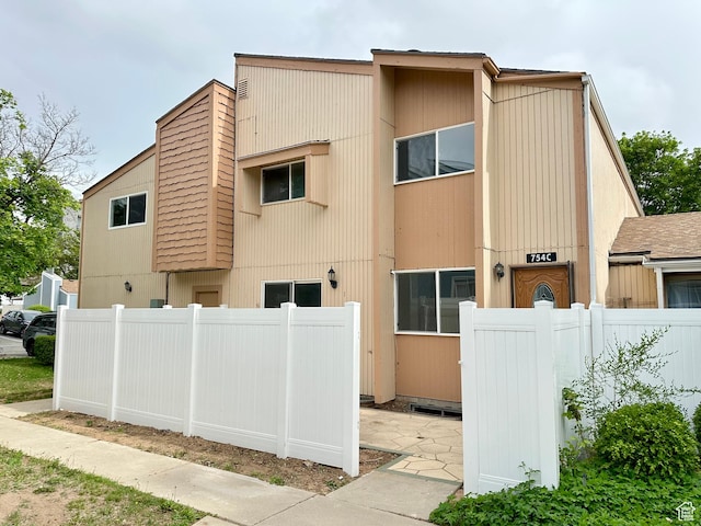 754 S 1650 E Unit C15, Clearfield, UT 84015 - view of home's exterior with fence